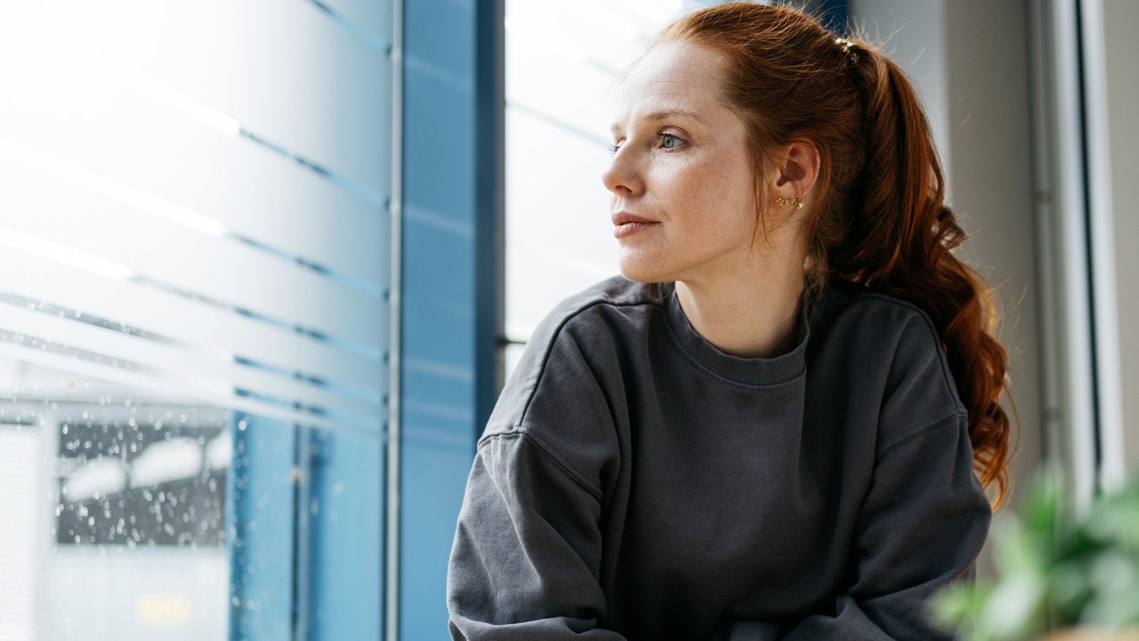Women with ADHD and anxiety staring outside